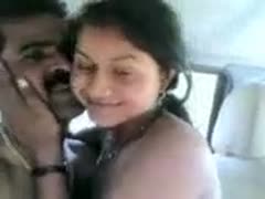 In the car, the attractive Indian cheating wife spreads her legs wide for her husband.